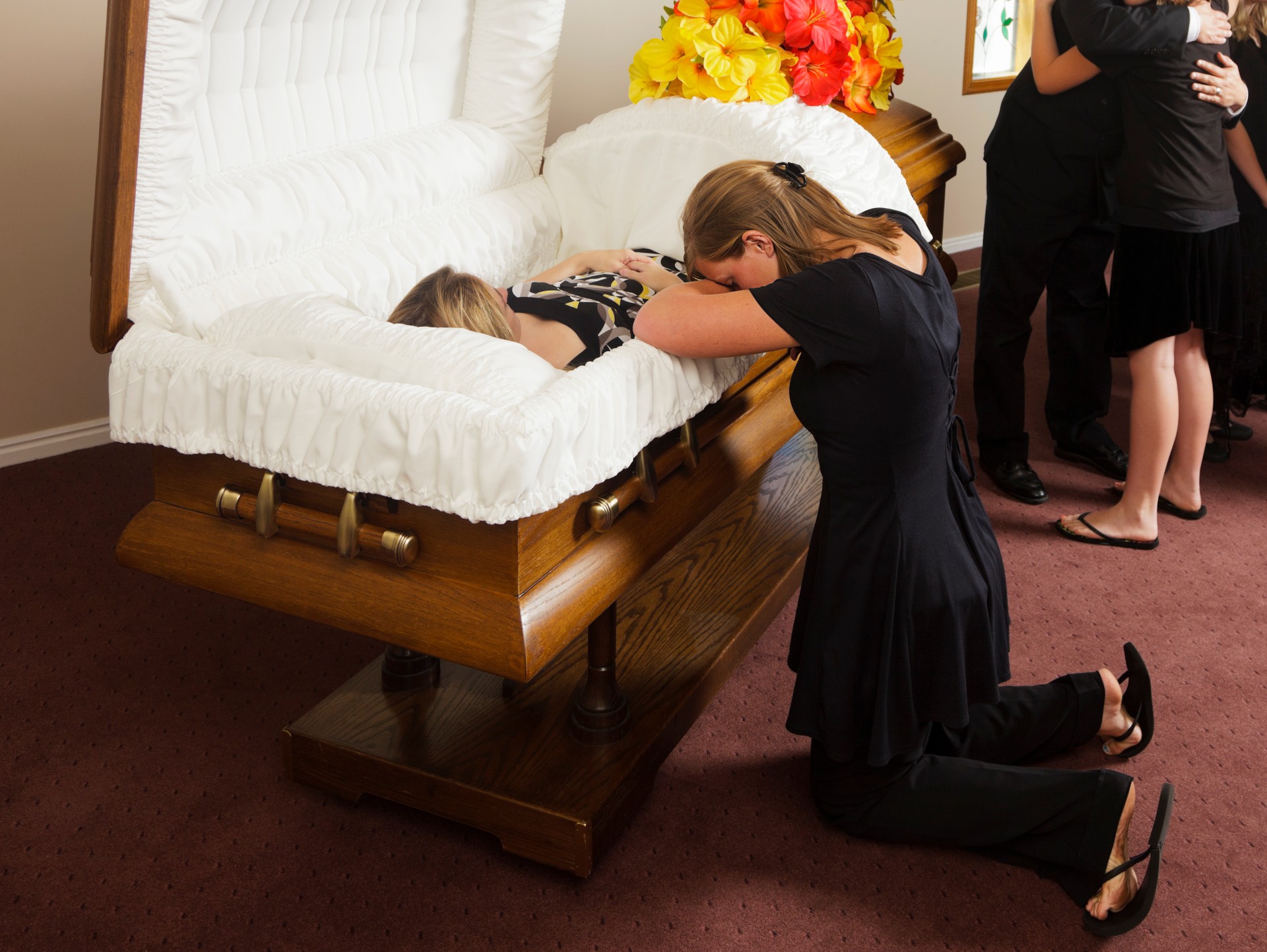 Grieving Young Woman at a Funeral